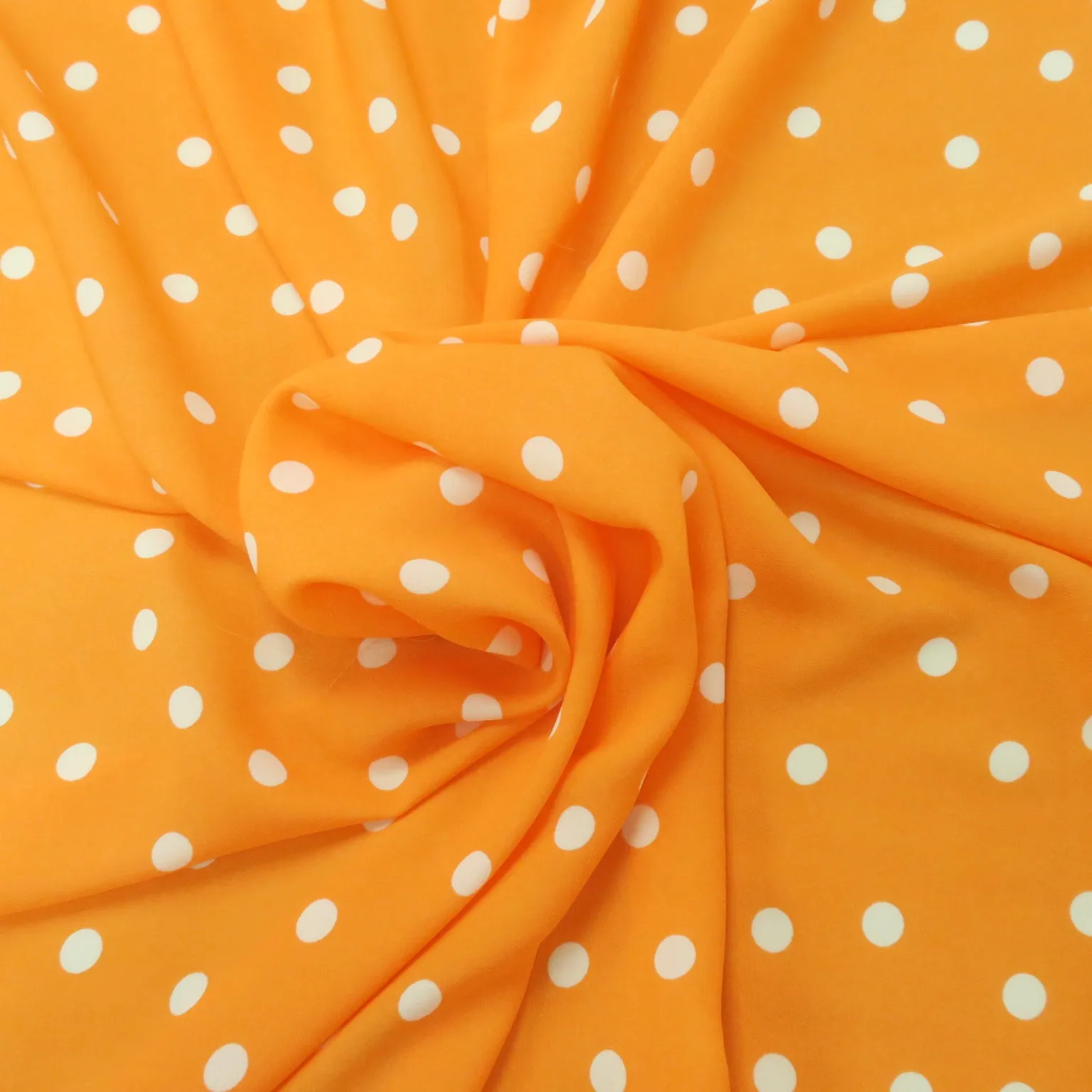 Small White Polka Dots on Orange Background Printed Crepe Fabric